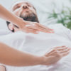 Close-up,View,Of,Bearded,Man,Receiving,Reiki,Healing,Session,Above
