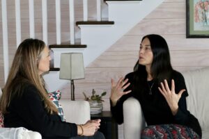 Two women business owners talking