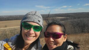 Image: Denise in green glasses and Lisa in Violet glasses